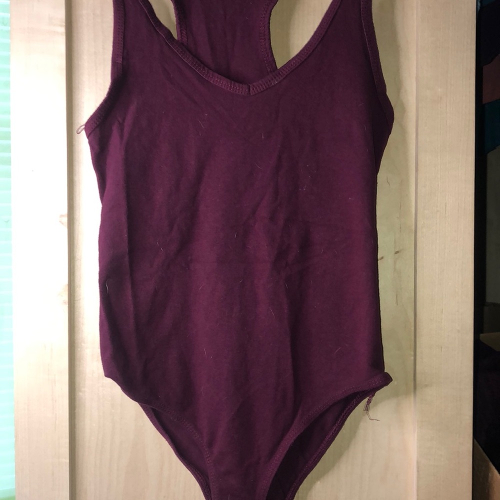 Small maroon body suit